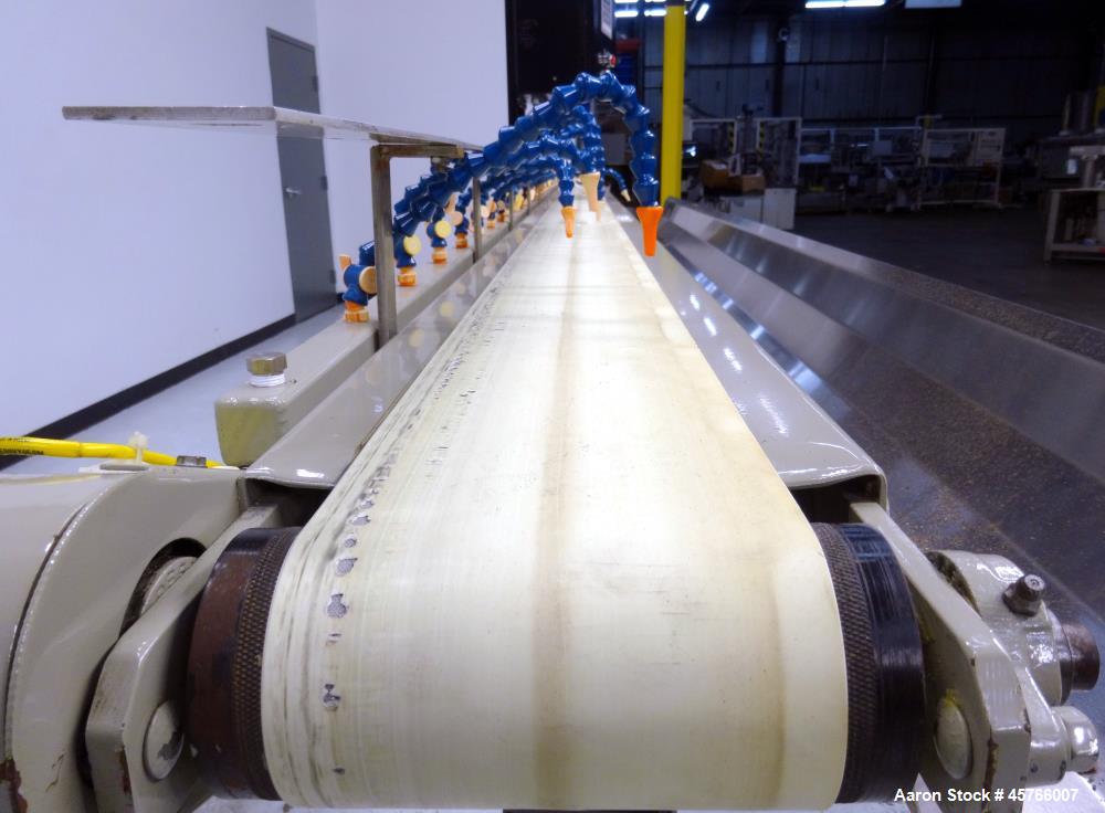 Used Conair TC Series Takeaway Conveyor, Model TC6-16. Approximate 6" wide x 192" long rubber belt, driven by a 1/3hp gear motor with a Baldor drive. Includes a Pneumatic ejector system with accumula...