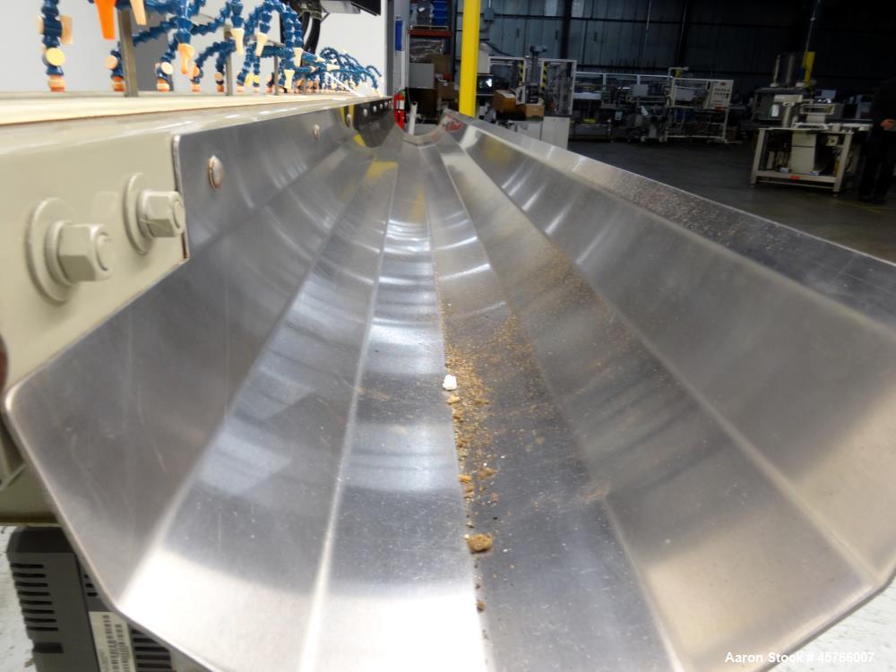 Used Conair TC Series Takeaway Conveyor, Model TC6-16. Approximate 6" wide x 192" long rubber belt, driven by a 1/3hp gear motor with a Baldor drive. Includes a Pneumatic ejector system with accumula...