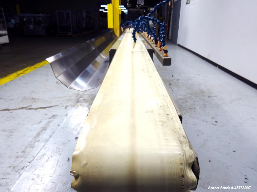 Used Conair TC Series Takeaway Conveyor, Model TC6-16. Approximate 6" wide x 192" long rubber belt, driven by a 1/3hp gear motor with a Baldor drive. Includes a Pneumatic ejector system with accumula...