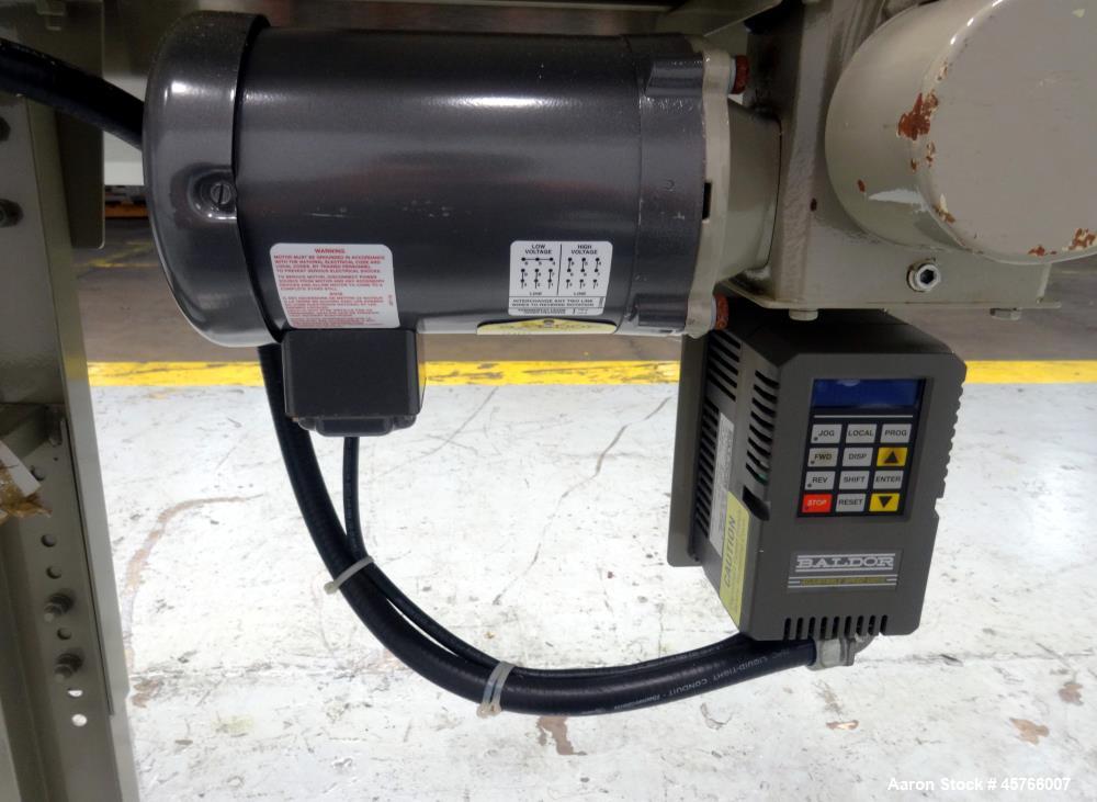 Used Conair TC Series Takeaway Conveyor, Model TC6-16. Approximate 6" wide x 192" long rubber belt, driven by a 1/3hp gear motor with a Baldor drive. Includes a Pneumatic ejector system with accumula...