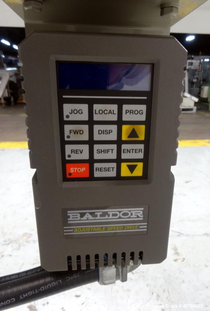 Used Conair TC Series Takeaway Conveyor, Model TC6-16. Approximate 6" wide x 192" long rubber belt, driven by a 1/3hp gear motor with a Baldor drive. Includes a Pneumatic ejector system with accumula...