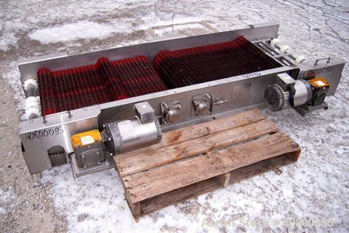 Used Heat And Control 2 Directional Belt Conveyor, Model DSFC. 24" wide x 80" long plastic belt. Includes (2) 1hp, 3/60/575 volt, 1725 rpm gear motors, each mounted on the same side. Mounted on a 304...