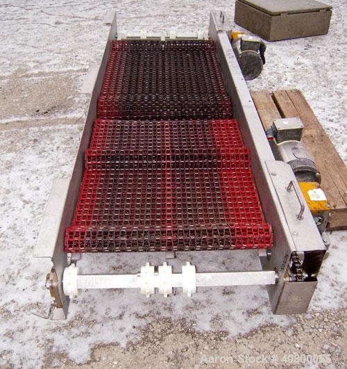 Used Heat And Control 2 Directional Belt Conveyor, Model DSFC. 24" wide x 80" long plastic belt. Includes (2) 1hp, 3/60/575 volt, 1725 rpm gear motors, each mounted on the same side. Mounted on a 304...