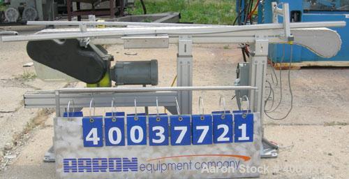 Used Flex-Link Belt Conveyor. 4" wide x 70" long plastic belt. Driven by a 1/2 HP, 3/60/208-230/460 Volt, 1725 RPM gearmotor.