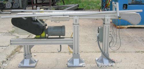 Used Flex-Link Belt Conveyor. 4" wide x 70" long plastic belt. Driven by a 1/2 HP, 3/60/208-230/460 Volt, 1725 RPM gearmotor.