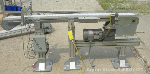 Used Flex-Link Belt Conveyor. 4" wide x 70" long plastic belt. Driven by a 1/2 HP, 3/60/208-230/460 Volt, 1725 RPM gearmotor.