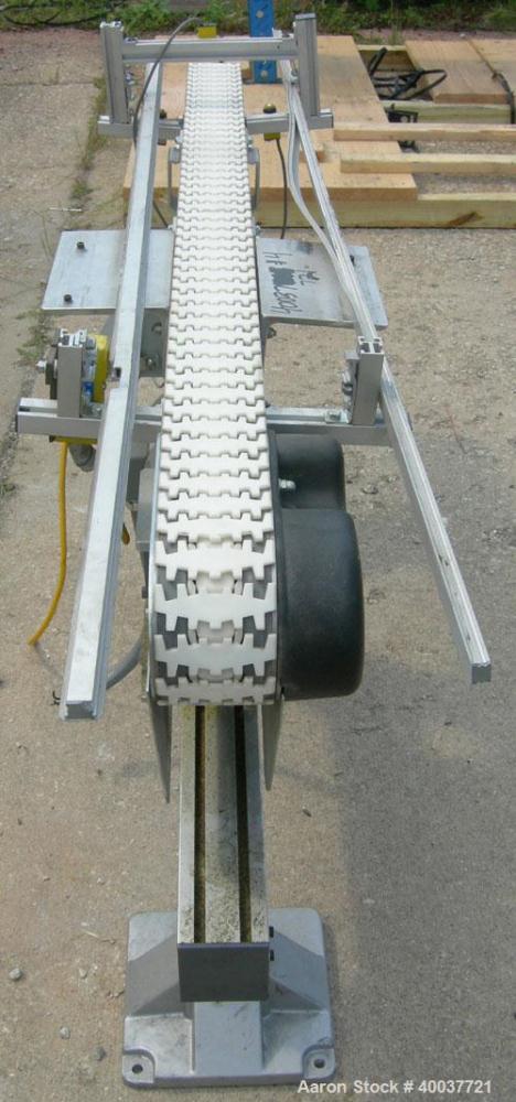 Used Flex-Link Belt Conveyor. 4" wide x 70" long plastic belt. Driven by a 1/2 HP, 3/60/208-230/460 Volt, 1725 RPM gearmotor.