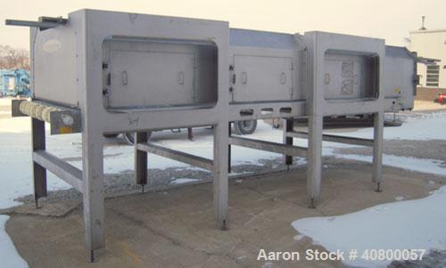 Used Heat and Control MinuteMan Accumulation Conveyor System, model CV-BT-ACCUM, 304 stainless steel. Approximate 200 cubic foot capacity. 60" wide x 204" long bottom product flow belt, driven by a 1...