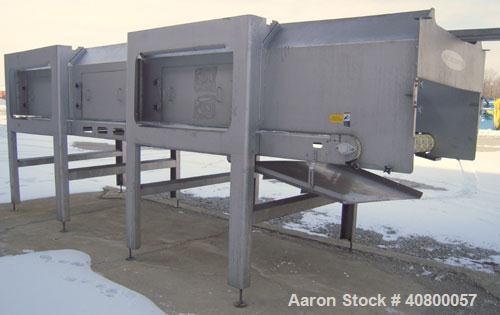 Used Heat and Control MinuteMan Accumulation Conveyor System, model CV-BT-ACCUM, 304 stainless steel. Approximate 200 cubic foot capacity. 60" wide x 204" long bottom product flow belt, driven by a 1...