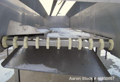 Used Heat and Control MinuteMan Accumulation Conveyor System, model CV-BT-ACCUM, 304 stainless steel. Approximate 200 cubic foot capacity. 60" wide x 204" long bottom product flow belt, driven by a 1...