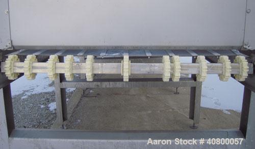 Used Heat and Control MinuteMan Accumulation Conveyor System, model CV-BT-ACCUM, 304 stainless steel. Approximate 200 cubic foot capacity. 60" wide x 204" long bottom product flow belt, driven by a 1...