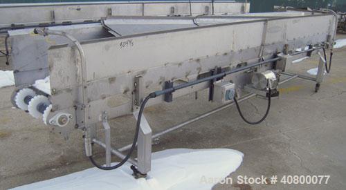 Used Heat And Control Deoiler Belt Conveyor, Model CV-BT-PL, 304 Stainless Steel. 18" Wide x 186" long belt, driven by a 3/4 hp, 3/60/575 volt, 1740 rpm gearmotor. Approximate 16" tall sidewalls. Mou...
