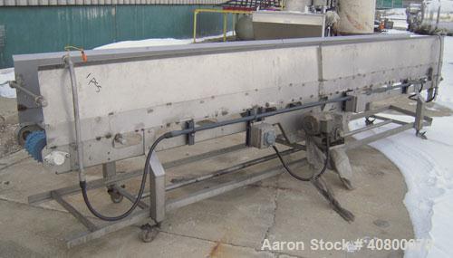 Used Heat And Control Deoiler Belt Conveyor, Model CV-BT-PL, 304 Stainless Steel. 18" Wide x 186" long belt. Driven by a 3/4 hp, 3/60/575 volt, 1740 rpm gearmotor. Approximate 18" tall sidewalls. Mou...