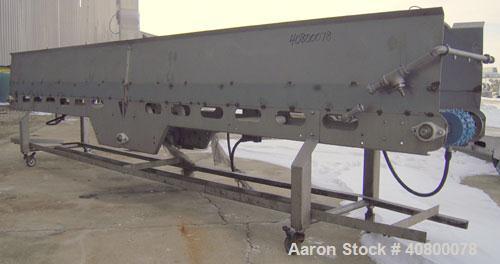 Used Heat And Control Deoiler Belt Conveyor, Model CV-BT-PL, 304 Stainless Steel. 18" Wide x 186" long belt. Driven by a 3/4 hp, 3/60/575 volt, 1740 rpm gearmotor. Approximate 18" tall sidewalls. Mou...