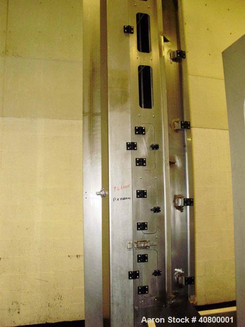 Used Vertical "Z" Shaped Conveyor, 304 stainless steel frame. 16" wide plastic belt, 48" long horizontal bottom infeed section, 144" long vertical section, 144" long horizontal top discharge section....