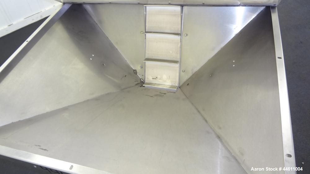 Used Hoppmann Elevating Prefeeder, Model EP, Series 8.  8" Wide rubber belt with 1-3/4" tall pleats placed approximately 6" apart.  Approximately 70" discharge height.  304 Stainless steel 8 cubic fo...