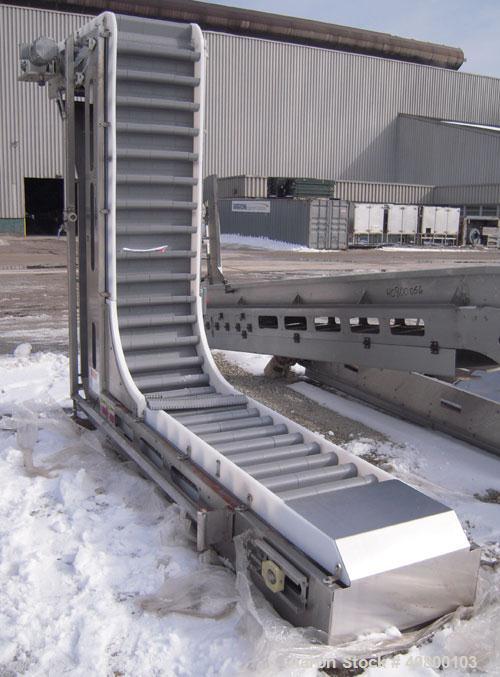 Unused- Key Technology Intralox Belt Conveyor, Model 435561, 304 stainless steel. Plastic belt with 4" flights on 6" centers, 24" wide (21 7/8" wide conveying width) x 84" horizontal bottom section x...