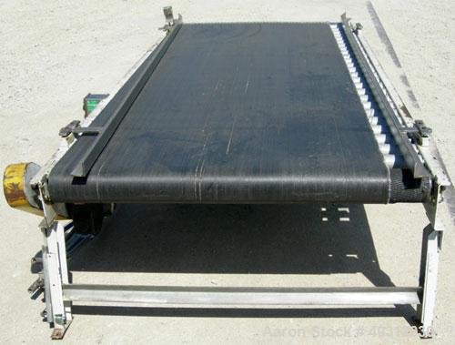 Used Lewco Equipment belt conveyor, model MDRB-48-4-112-20. 45" wide x 108" long rubber belt. Driven by a 1/2 hp, 3/60/208-230/460 volt, 1725 rpm gearmotor, ratio 40 to 1. 2" tall adjustable side rai...