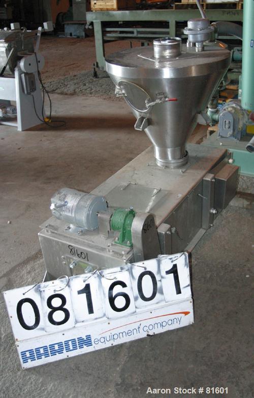USED: Merrick weighbelt feeder, model 950, 304 stainless steel. 12"wide x 40" long belt. Driven by a 1/4 hp DC motor with reducer. 7-3/4"top inlet with hopper. Unit requires controls.