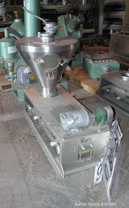 USED: Merrick weighbelt feeder, model 950, 304 stainless steel. 12"wide x 40" long belt. Driven by a 1/4 hp DC motor with reducer. 7-3/4"top inlet with hopper. Unit requires controls.