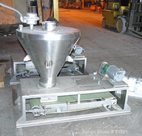 USED: Merrick weighbelt feeder, model 950, 304 stainless steel. 12"wide x 40" long belt. Driven by a 1/4 hp DC motor with reducer. 7-3/4"top inlet with hopper. Unit requires controls.