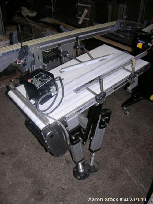 Used Dorner inclined belt conveyor, series 2200. 18" wide x 34" long belt. Driven by a variable speed, 115 volt motor.