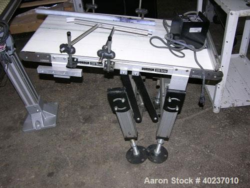 Used Dorner inclined belt conveyor, series 2200. 18" wide x 34" long belt. Driven by a variable speed, 115 volt motor.
