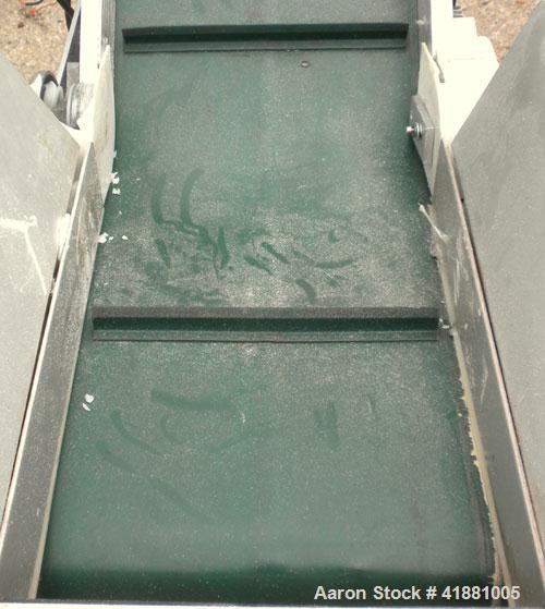 Used Crizaf Incline Belt Conveyor, Model LTCH/1-0510. 10" wide x 12" horizontal section x 40" incline section. Driven by a 1/6 hp, 1/60/115 volt, 40 rpm gear motor, ratio 42.7:1. Approximate 70" disc...