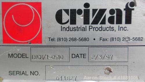 Used Crizaf Incline Belt Conveyor, Model LTCH/1-0510. 10" wide x 12" horizontal section x 40" incline section. Driven by a 1/6 hp, 1/60/115 volt, 40 rpm gear motor, ratio 42.7:1. Approximate 70" disc...