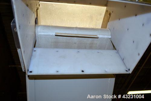 Used Bulk Elevator Feeder, Stainless Steel. Approximate 10" widex 84’’ long pleated belt, approximate 80" discharge height. 56’’ x 42’’ x 24’’ Deep bulk supply hopper. Driven by an approximate 1/2 hp...
