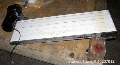 Used Dorver Belt Conveyor. 12" wide x 38" long. Driven by a 1/3 hp, 130 volt motor.