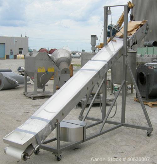 Used Incline Belt Conveyor, 304 stainless steel. 12" wide x 172" long rubber belt, driven by a 1 hp, 3/60/460 volt, 1745 rpm gearmotor, ratio 30 to 1 with a Danfoss VLT 2800 controller. Manually adju...