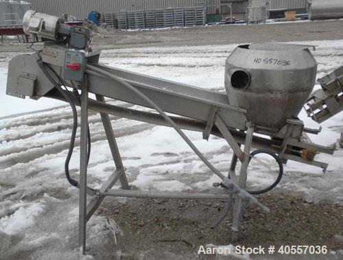 Used Incline Belt Conveyor. 12" wide x 84" long cleated rubber belt. Driven by a 1 hp, 3/60/208-230/460 volt, 1740 rpm gear motor, ratio 50 to 1. Mounted on a stainless steel frame.