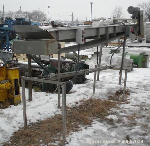 Used Belt Conveyor, 18" wide x 148" long rubber belt. Driven by a 1 hp, 3/60/230/460 volt, 1725 rpm gear motor, no ratio. Mounted on a stainless steel frame.