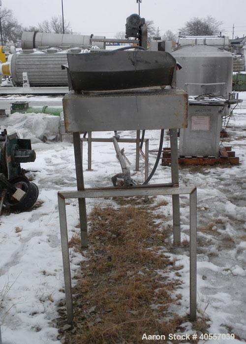 Used Belt Conveyor, 18" wide x 148" long rubber belt. Driven by a 1 hp, 3/60/230/460 volt, 1725 rpm gear motor, no ratio. Mounted on a stainless steel frame.