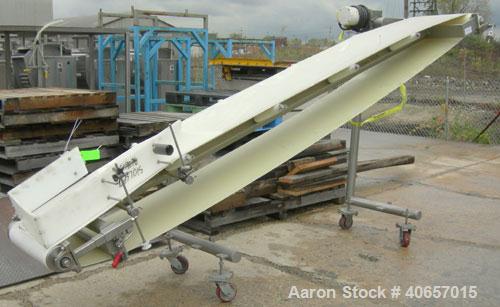 Used Inclined Belt Conveyor, 23 1/2" wide x 152" long rubber belt. Driven by a 1 hp, 3/60/208-230/460 volt, 1725 rpm gearmotor, ratio 10 to 1. Mounted on a stainless steel frame with casters, approxi...