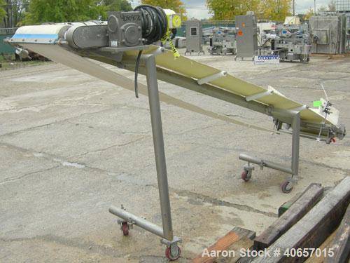 Used Inclined Belt Conveyor, 23 1/2" wide x 152" long rubber belt. Driven by a 1 hp, 3/60/208-230/460 volt, 1725 rpm gearmotor, ratio 10 to 1. Mounted on a stainless steel frame with casters, approxi...