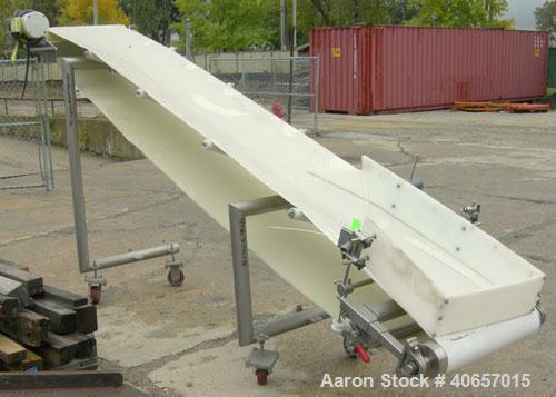 Used Inclined Belt Conveyor, 23 1/2" wide x 152" long rubber belt. Driven by a 1 hp, 3/60/208-230/460 volt, 1725 rpm gearmotor, ratio 10 to 1. Mounted on a stainless steel frame with casters, approxi...
