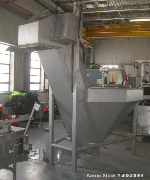 Used Inclined Plastic Belt Conveyor. 18" wide x 96" long with 9" wide x 3" tall offset pockets. 301 stainless steel supply feed hopper, 64" wide x 56" long x approximately 56" deep. Driven by an appr...