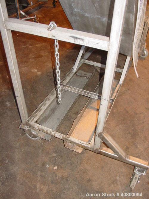 Used Inclined "S" Shaped Conveyor, 304 stainless steel frame. 14" wide x 3" tall cleated plastic belt, 24" long bottom infeed section, 72" long incline section, 12" long top discharge section, approx...