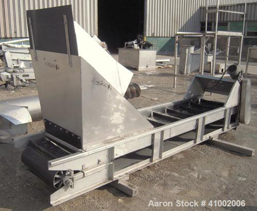 Used Incline Belt Conveyor. 23 1/2" wide x 132" long rubber belt. Driven by a 1 hp, 3/60/208-230/460 volt, 1725 rpm gearmotor. Mounted on a 304 stainless steel frame.