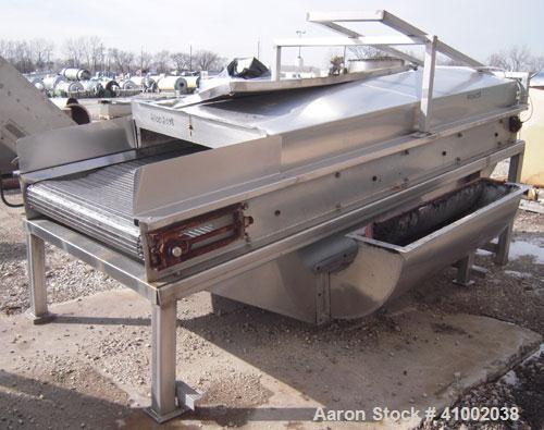 Used Inclined Cooling Belt Conveyor, 304 stainless steel. 36" wide x 102" long wire mesh stainless steel belt. Driven by a 3/4 hp, 90 volt, 1750 rpm DC gearmotor. Mounted on stainless steel frame.