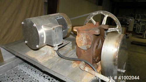 Used Ron Bichel Inclined Plastic Belt Conveyor. 24" wide x 116" long with 11 1/2" wide x 1/2" tall pockets. Driven by a 3/4 hp, 3/60/208-230/460 volt, 1750 rpm motor thru a reducer, ratio 20 to 1. 54...