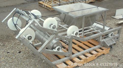 Used Inclined "S" Shaped Belt Conveyor. Approximate 24" wide rubber belt with 17" wide x 10" long x 3" deep pockets. Approximate 48" long bottom section with 27" x 27" feed hopper x 156" long incline...