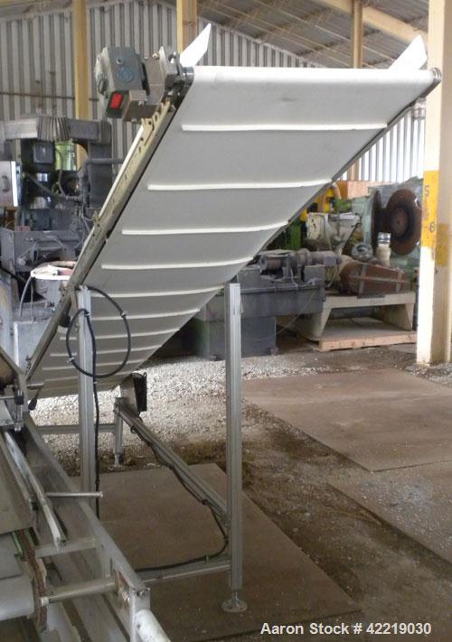 Used QC Industries Inclined Belt Conveyor, carbon steel. 21" wide x 140" long rubber belt, 12" long pockets. 74" discharge height. Driven by a .33 hp, 90 volt, 1750 rpm DC gear motor, ratio 20 to 1. ...