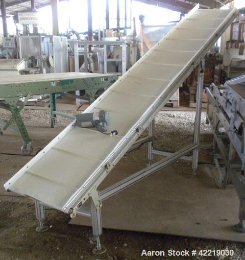Used QC Industries Inclined Belt Conveyor, carbon steel. 21" wide x 140" long rubber belt, 12" long pockets. 74" discharge height. Driven by a .33 hp, 90 volt, 1750 rpm DC gear motor, ratio 20 to 1. ...