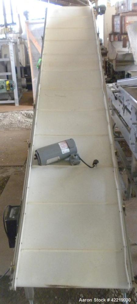 Used QC Industries Inclined Belt Conveyor, carbon steel. 21" wide x 140" long rubber belt, 12" long pockets. 74" discharge height. Driven by a .33 hp, 90 volt, 1750 rpm DC gear motor, ratio 20 to 1. ...