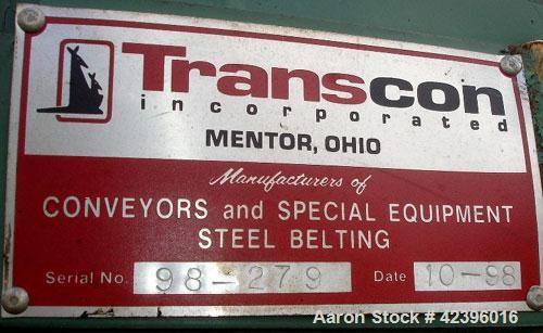 Used Transcon Z Style Metal Cleated Belt Conveyor. 12" Wide x 8' long flat section, 8.5' long inclined section, 19" long flat section, approximate 74" high discharge height. Driven by a 0.75 hp, 230/...