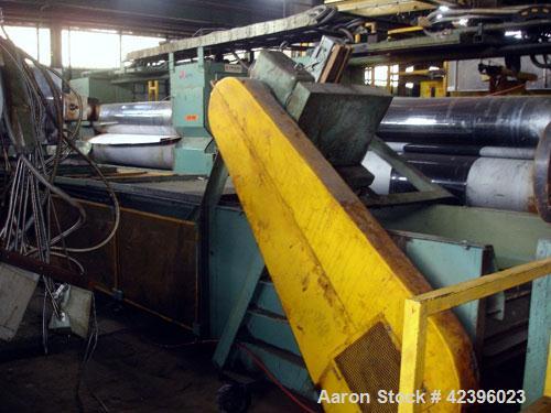Used Z Style Metal Cleated Belt Conveyor. 36" Wide x 20' long flat section, 11' long inclined section, approximate 84" high discharge height. 18’’ Tall side rails, approximate 32’ overall length. Dri...