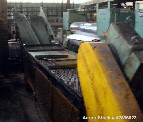 Used Z Style Metal Cleated Belt Conveyor. 36" Wide x 20' long flat section, 11' long inclined section, approximate 84" high discharge height. 18’’ Tall side rails, approximate 32’ overall length. Dri...